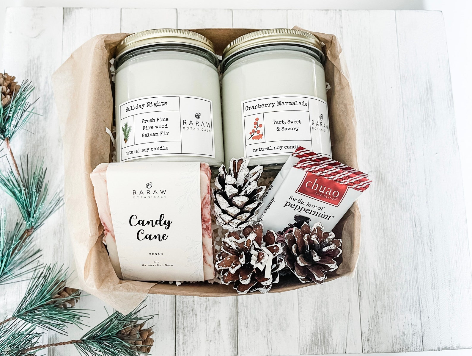 holiday gift box contents - candles - soap - chocolate - pine cones